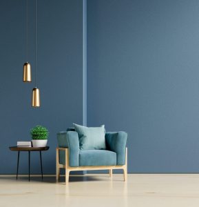 dark blue painted wall with chair